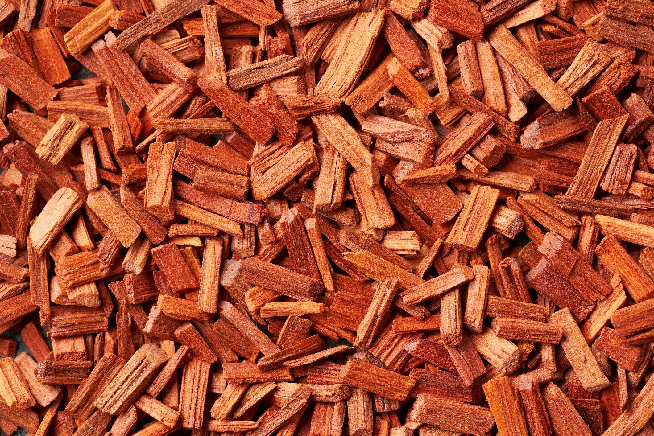 Colección de fragancias exclusivas y muestras con aroma a madera de sándalo.
